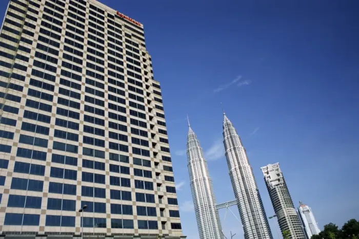 Framed Print : Petronas twin towers and business building on left Framed Print : Petronas twin towers and business building on left