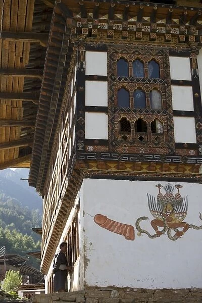 Phallus painted on wall of house to ward off evil spirits, Paro, Bhutan, Asia