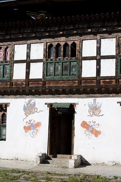 Phallus symbols on house to ward off evil spirits, Paro, Bhutan, Asia
