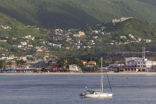 Philipsburg waterfront and beach in the early morning, with yacht, St. Maarten (St. Martin), West Indies, Caribbean, Central America