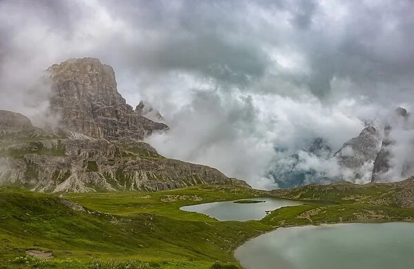 Piani lakes and Scarpieri peak on a foggy and cloudy day, Dolomites, Alto Adige district