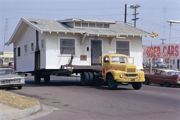 Pick-up truck moving house