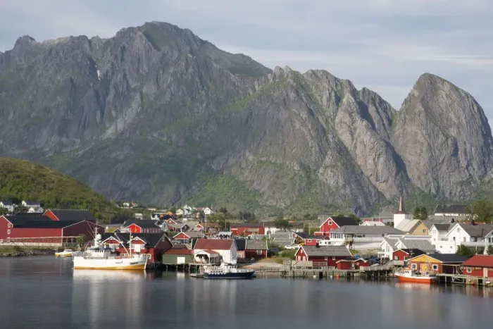 Framed Print : The picturesque fishing village of Reine surrounded by mountains on Moskenesoya, Lofoten Framed Print : The picturesque fishing village of Reine surrounded by mountains on Moskenesoya, Lofoten