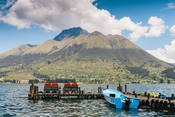 A pier and boat at the base of Volcan Imbabura and Lago San Pablo, close to the famous