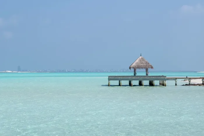 Framed Print : Pier and the clear waters of the lagoon on an exotic Island in The Maldives, Indian Ocean Framed Print : Pier and the clear waters of the lagoon on an exotic Island in The Maldives, Indian Ocean