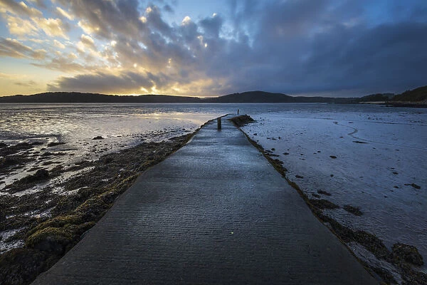 Pier at low tide at sunset, Rockcliffe, Dalbeattie, Dumfries and Galloway, Scotland, United Kingdom, Europe