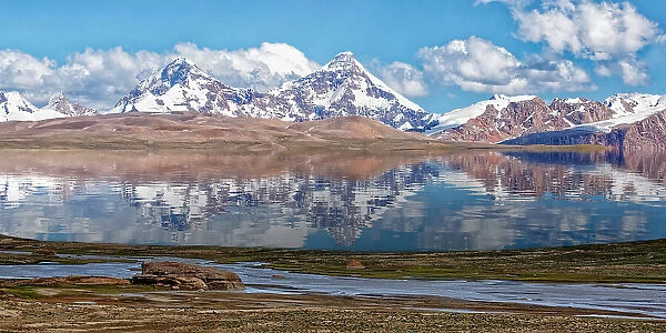 Pik Dankova peak reflecting in water, Tian Shan mountains at the Chinese border, Naryn province, Kyrgyzstan, Central Asia, Asia