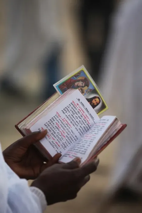 Framed Print : Pilgrim reading Bible in Amharic, Timkat festival, Gondar, Ethiopia, Africa Framed Print : Pilgrim reading Bible in Amharic, Timkat festival, Gondar, Ethiopia, Africa