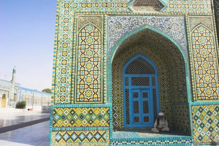 Framed Print : Pilgrim sits in a niche at the Shrine of Hazrat Ali, who was assassinated in 661 Framed Print : Pilgrim sits in a niche at the Shrine of Hazrat Ali, who was assassinated in 661
