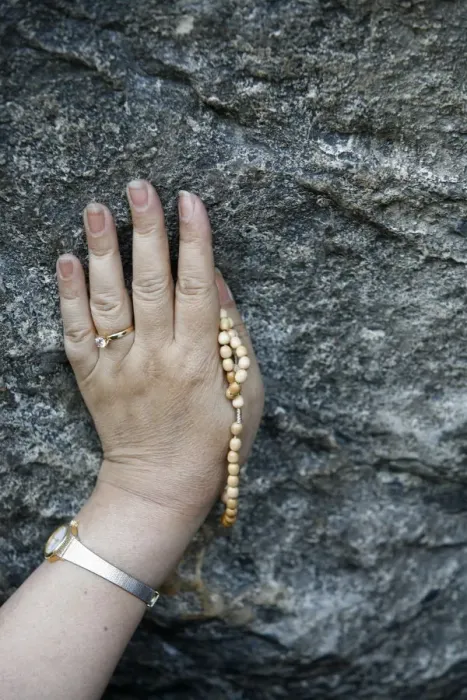 Framed Print : Pilgrim touching the Lourdes grotto, Lourdes, Hautes Pyrenees, France, Europe Framed Print : Pilgrim touching the Lourdes grotto, Lourdes, Hautes Pyrenees, France, Europe