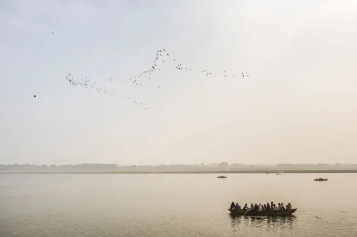 Framed Print : Pilgrims on a boat on the River Ganges, Varanasi, Uttar Pradesh, India, Asia