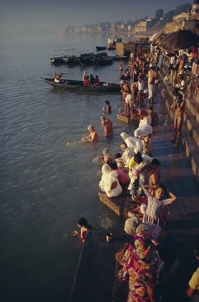 Pilgrims on the ghats by the River Ganges (Ganga)