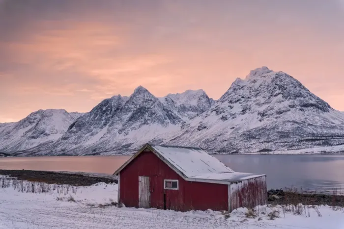 Framed Print : Pink clouds at dawn on the wooden hut surrounded by frozen sea and snowy peaks, Svensby Framed Print : Pink clouds at dawn on the wooden hut surrounded by frozen sea and snowy peaks, Svensby