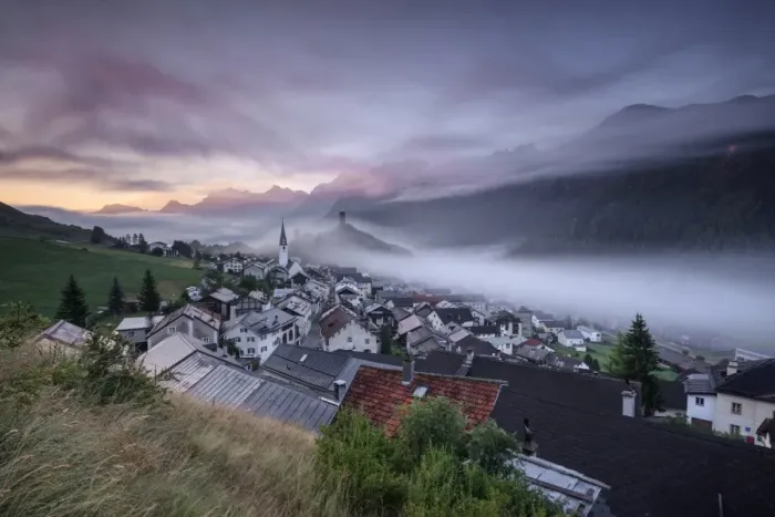 Framed Print : Pink clouds and mist on the village of Ardez at dawn, district of Inn, Lower Engadine Framed Print : Pink clouds and mist on the village of Ardez at dawn, district of Inn, Lower Engadine