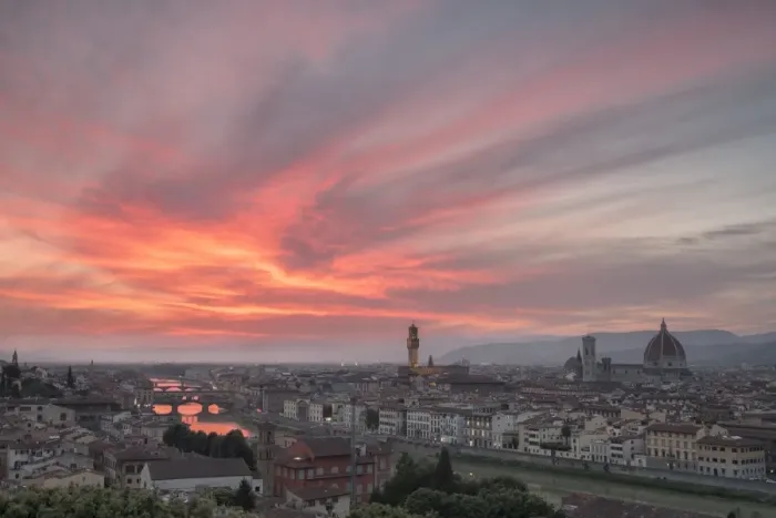 Framed Print : Pink clouds at sunset frame the city of Florence crossed by Arno River seen Framed Print : Pink clouds at sunset frame the city of Florence crossed by Arno River seen