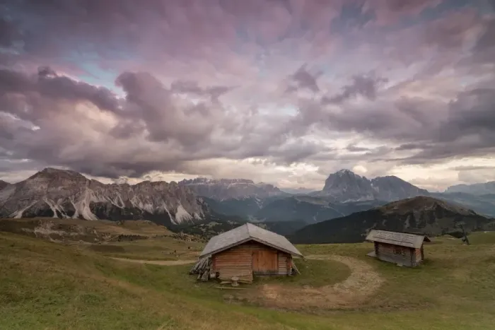 Framed Print : Pink clouds at sunset on the typical huts of Odle mountain range seen from Seceda Framed Print : Pink clouds at sunset on the typical huts of Odle mountain range seen from Seceda