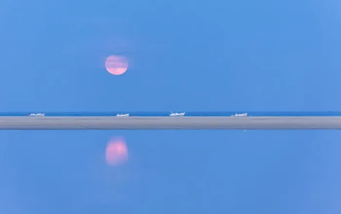 Framed Print : The pink full moon is reflected in the blue water of the Notteri pond, Villasimius Framed Print : The pink full moon is reflected in the blue water of the Notteri pond, Villasimius