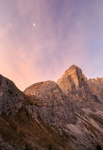Pink sky at dawn on the peaks of Forcella De Furcia, Funes Valley, South Tyrol, Dolomites