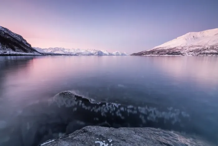Framed Print : Pink sky and snowy peaks reflected in the frozen sea at sunset, Manndalen, Kafjord Framed Print : Pink sky and snowy peaks reflected in the frozen sea at sunset, Manndalen, Kafjord