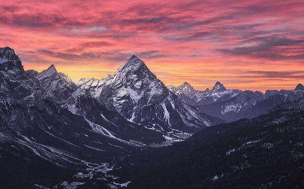 Pink sunrise on Antelao and Cortina d Ampezzo valley in winter with snow, Dolomites