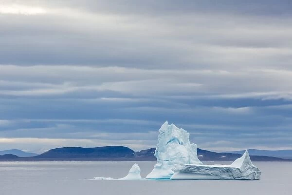 Pinnacled iceberg in Isabella Bay, Baffin Island, Nunavut, Canada, North America