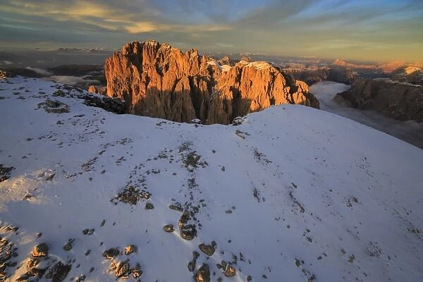 The pinnacles of the Sassolungo (Langkofel), in the red rays of the sunset, South Tyrol, Dolomites, Italy, Europe