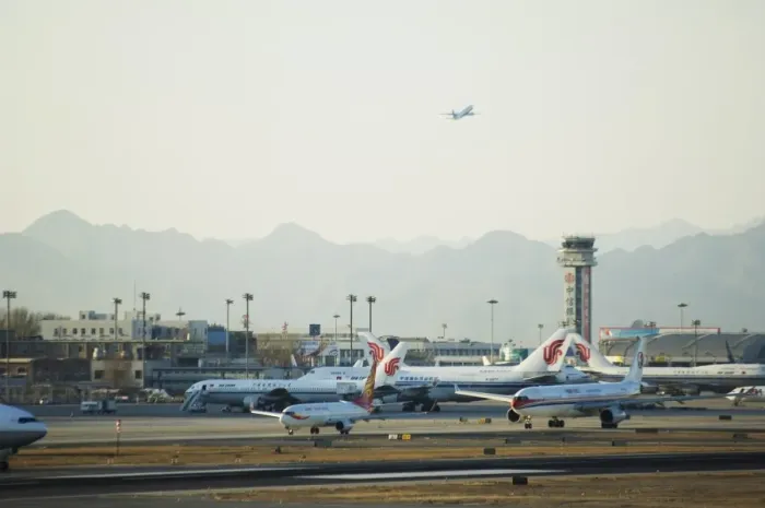 Framed Print : Planes taking off and taxi-ing on the runway at Beijing Capital Airport part of new Terminal 3 building opened February 2008, second largest building in the world, Beijing Framed Print : Planes taking off and taxi-ing on the runway at Beijing Capital Airport part of new Terminal 3 building opened February 2008, second largest building in the world, Beijing