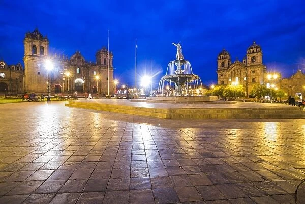 Plaza de Armas Fountain, Cusco Cathedral and Church of the Society of Jesus at night
