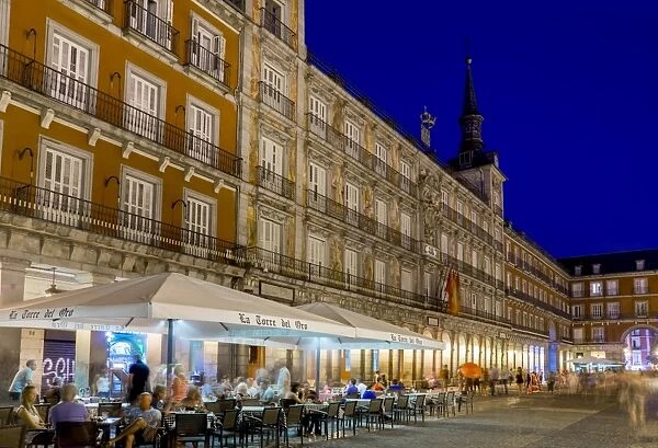 Plaza Mayor cafes at dusk, Madrid, Spain, Europe