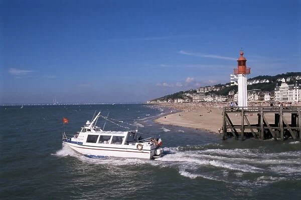 Pleasure boat and lighthouse, Trouville, Basse Normandie (Normandy), France, Europe