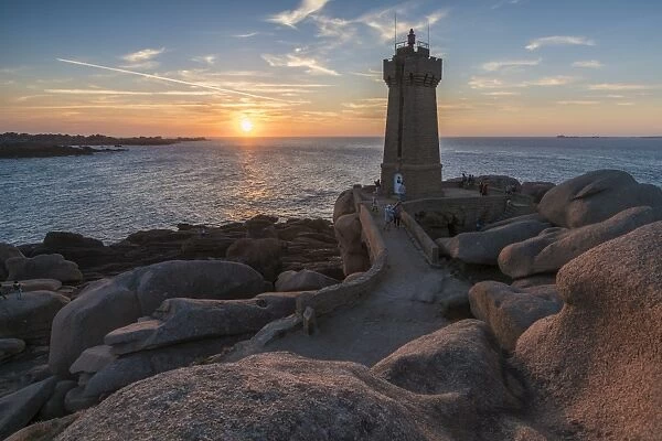Ploumanach lighthouse at sunset, Perros-Guirec, Cotes-d Armor, Brittany, France, Europe