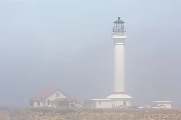 Point Arena Lighthouse in fog, Mendocino County, California, United States of America, North America