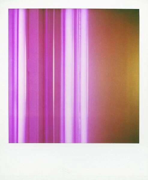 Polaroid of colourful stripes created by coloured fluorescent tubes