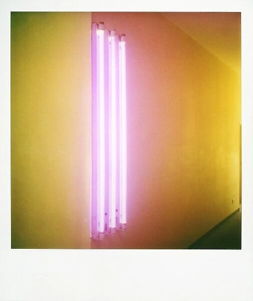 Polaroid of colourful stripes created by coloured fluorescent tubes