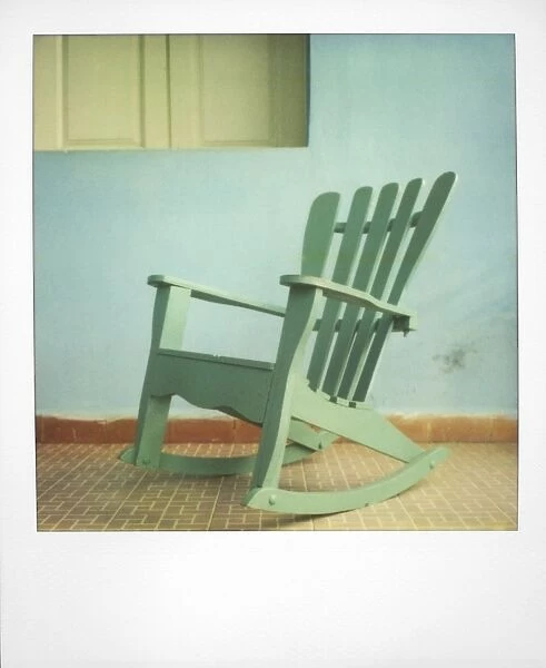 Polaroid of green chair on porch of traditional house, Vinales, Cuba, West Indies