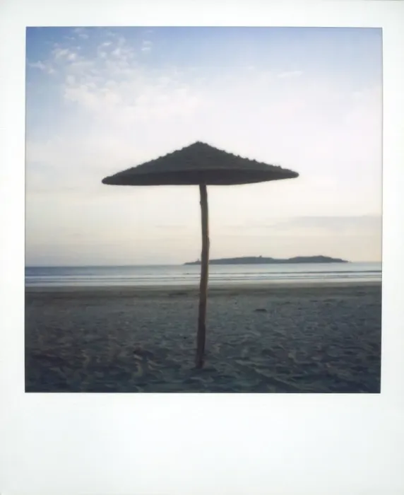 Framed Print : Polaroid image of brach parasol on deserted beach at dusk Framed Print : Polaroid image of brach parasol on deserted beach at dusk