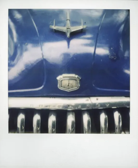 Framed Print : Polaroid of detail of bonnet and chrome grill of blue classic American car
