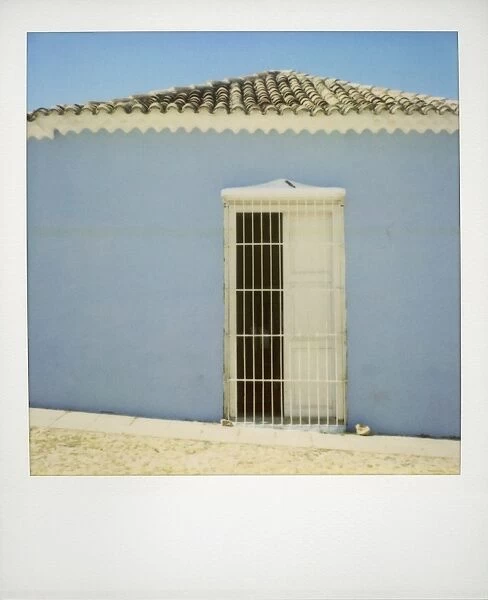 Polaroid of painted blue wall, Trinidad, Cuba, West Indies, Central America