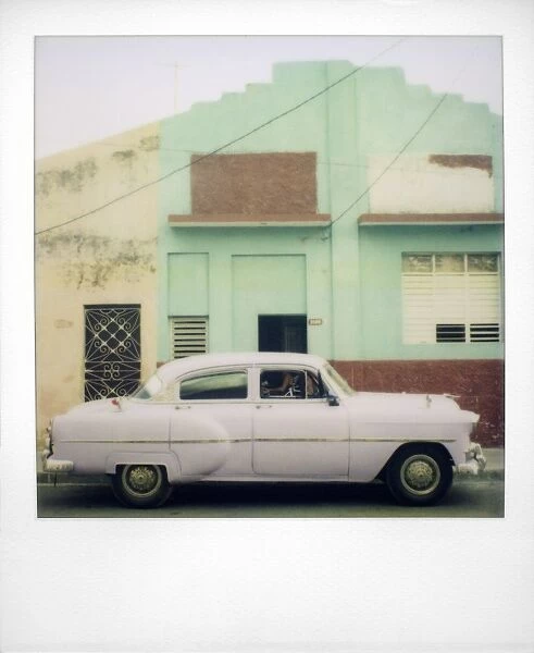 Polaroid of purple classic American car, Cienfuegos, Cuba, West Indies, Central America