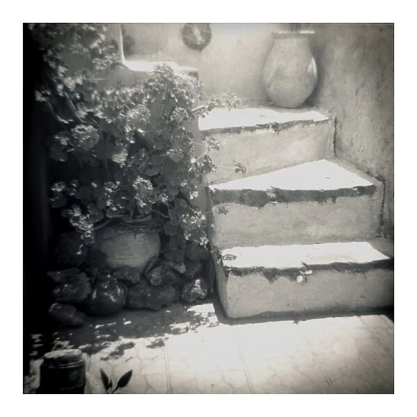 Polaroid of whitewashed stone steps