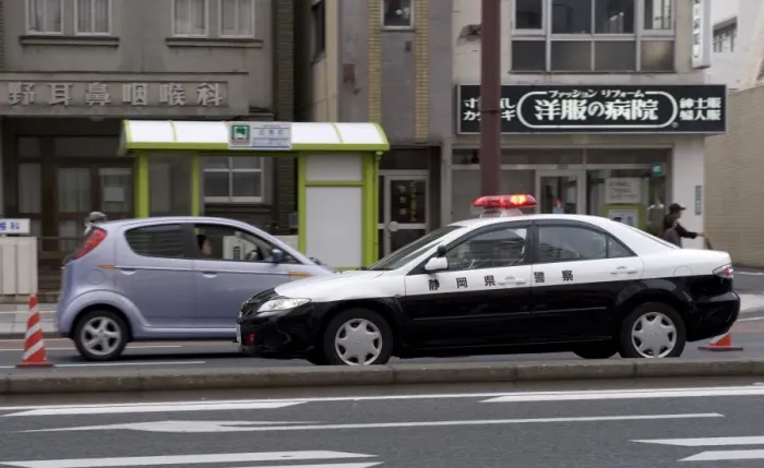 Framed Print : A police car from Shizuoka Prefecture speeding past, Tokyo, Japan, Asia Framed Print : A police car from Shizuoka Prefecture speeding past, Tokyo, Japan, Asia