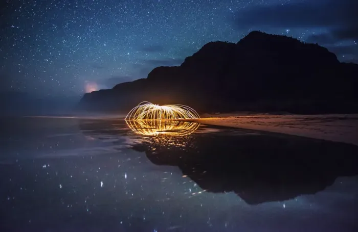 Framed Print : Polihale State Park under a starry sky with sparks being reflected in a tidal pool Framed Print : Polihale State Park under a starry sky with sparks being reflected in a tidal pool