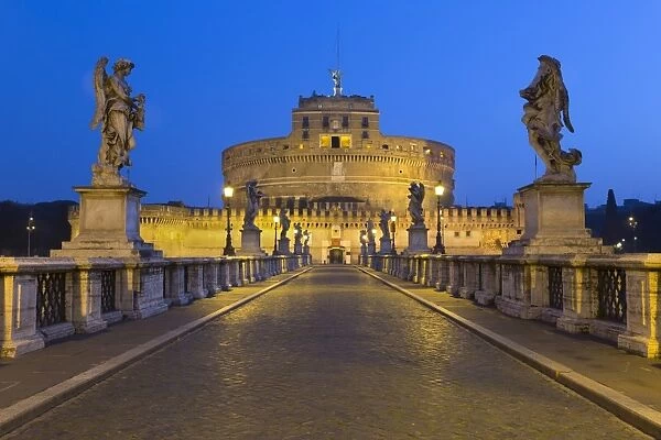 Ponte Sant Angelo with 16th century statues and the Castel Sant Angelo at night, Rome
