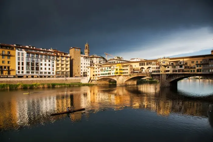 Framed Print : Ponte Vecchio reflected in the Arno River against a dark blue stormy sky, Florence Framed Print : Ponte Vecchio reflected in the Arno River against a dark blue stormy sky, Florence