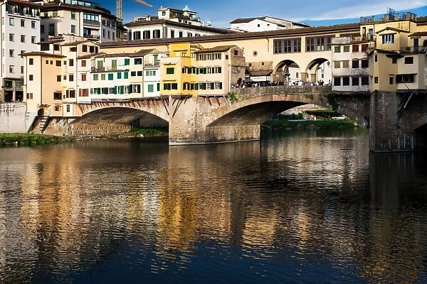 Ponte Vecchio reflected in the Arno River, Florence, UNESCO World Heritage Site, Tuscany