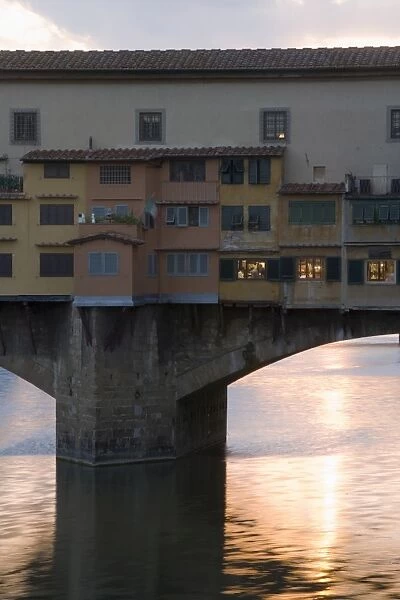 The Ponte Vecchio and the river Arno at dusk, Florence, Tuscany, Italy, Europe