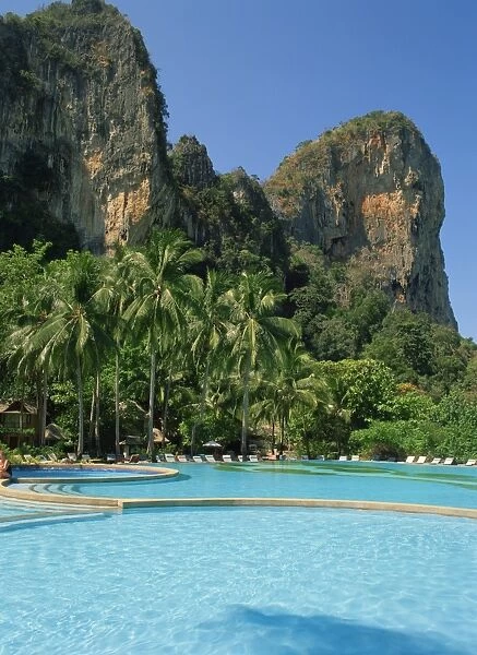 Pool at the Dusit Rayavadee Hotel with limestone rock