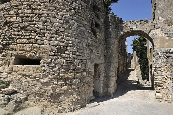 Portail des Chevres (old town gate) in the picturesque medieval village of Lacoste