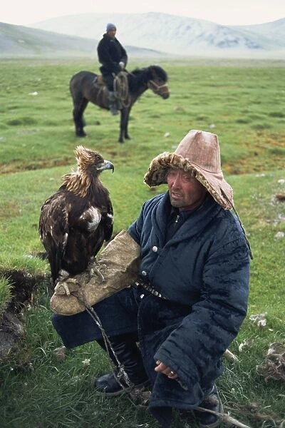 Portrait of an eagle breeder in traditional clothing