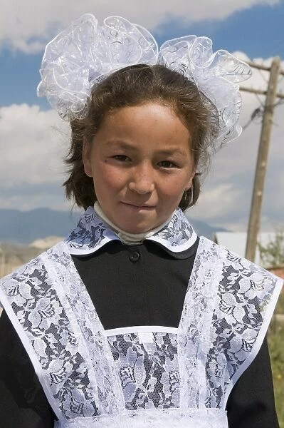 Portrait of girl in traditional clothes, Torugart, Kyrgyzstan, Central Asia, Asia